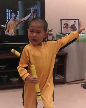 Five-Year-Old Kid Perfectly Reenacts Bruce Lee's Nunchaku Scene From GAME OF DEATH