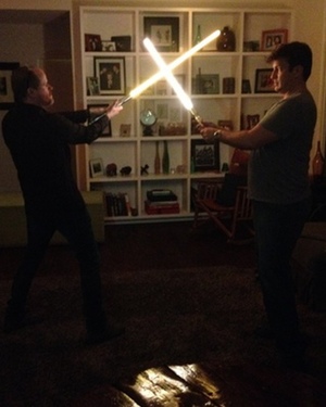 Photo of Joss Whedon and Nathan Fillion Locked in Lightsaber Duel!