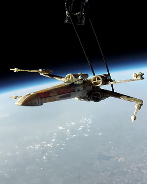 These Guys Put An X-Wing Toy in Space Hoping to Get STAR WARS Premiere Tickets