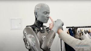 This A.I. Humanoid Robot Instinctively Pushes a Human's Hand Away When Its Nose is Touched