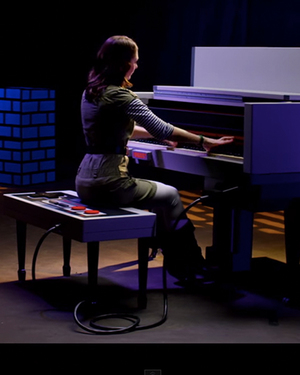 Watch: SUPER MARIO BROS. Theme Played on Nintendo-Shaped Piano