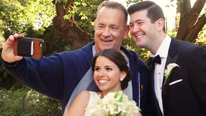 Watch: Tom Hanks Crashed This Couple's Central Park Wedding Photos