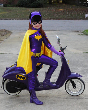 Mini Batgirl Cosplay Complete with Mini Batcycle