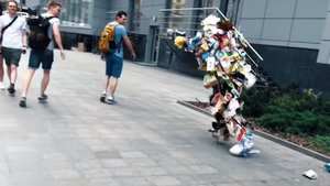 A Pile of Trash Rises up To Scare The Crap Out of People on the Street