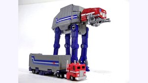 Custom Made TRANSFORMERS Action Figure Shows Optimus Prime Transform Into an AT-AT