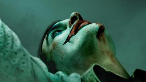 First Poster for DC's JOKER and the Trailer Is Coming Tomorrow!