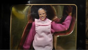 Guy Hilariously Reviews Horrible Officially Licensed Aunt May Action Figure