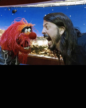 It's Animal vs. Dave Grohl in an Intense Drum Battle