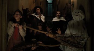 A HAUNTING IN VENICE Clip Takes Us To a Halloween Party Where Hercule Poirot Explains His Disbelief in The Supernatural