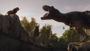 New JURASSIC WORLD: FALLEN KINGDOM TV Spot Features The T-Rex Face Off With a Lion