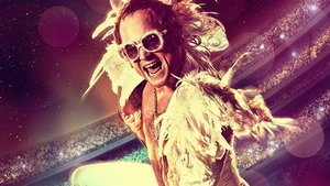 Poster For The Elton John Biopic ROCKETMAN and a Featurette Focusing on Taron Egerton Singing