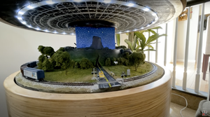 This Custom End Table Has a Built-In CLOSE ENCOUNTERS OF THE THIRD KIND-Themed Train Layout