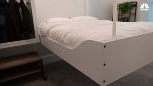 This Smart Home Stores Your Bed And Belongings In The Ceiling To Maximize Space