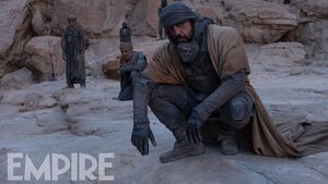 Two New Photos From DUNE Feature Oscar Isaac, Rebecca Ferguson, and Javier Bardem