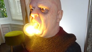 Uncle Fester From THE ADDAMS FAMILY Gets a Life-Size Lamp with a Lightbulb in His Mouth