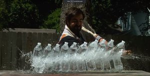 Watch a Katana Slice Through Plastic Bottles in Slow Motion